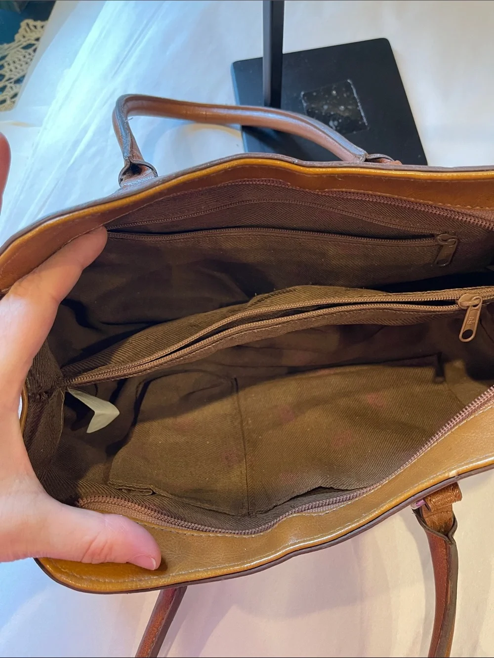 Rina Rich Brown and Tan Leather and vinyl Handbag Label View
